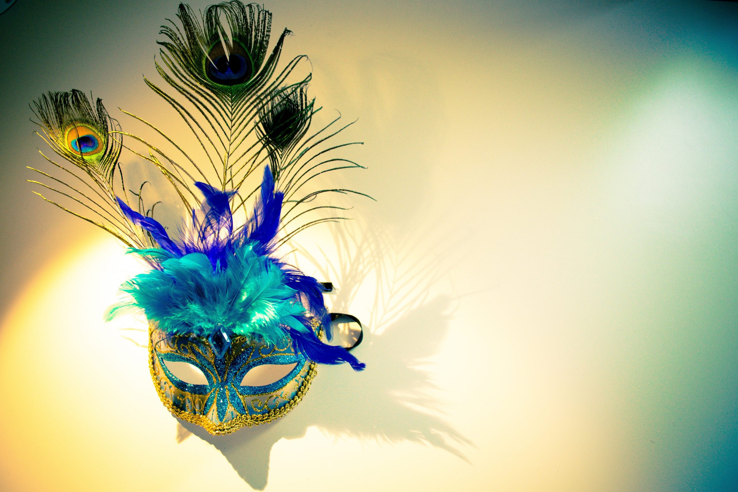 blue and gold theater mask